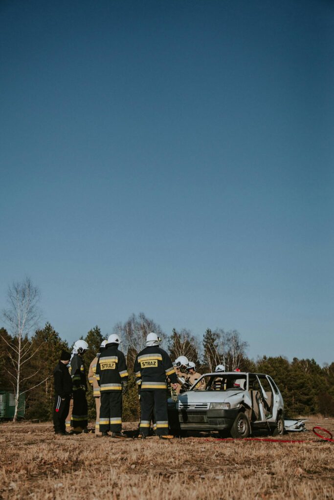Firefighters conducting a training exercise in a rural field, Ocypel, Poland.